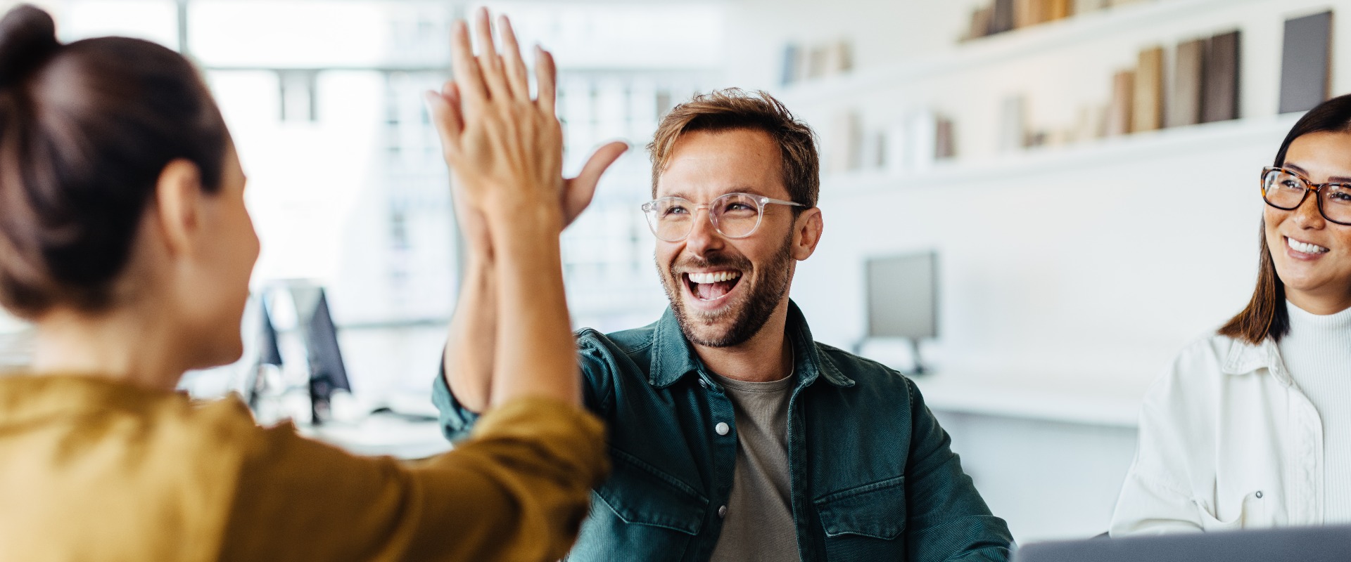 Business people celebrating success in an office